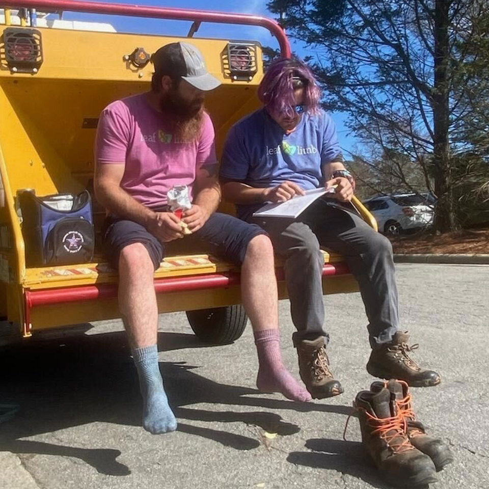 Crew members took a quick lunch break to review plans. Planning and preparation ensure we meet quality standards every time.